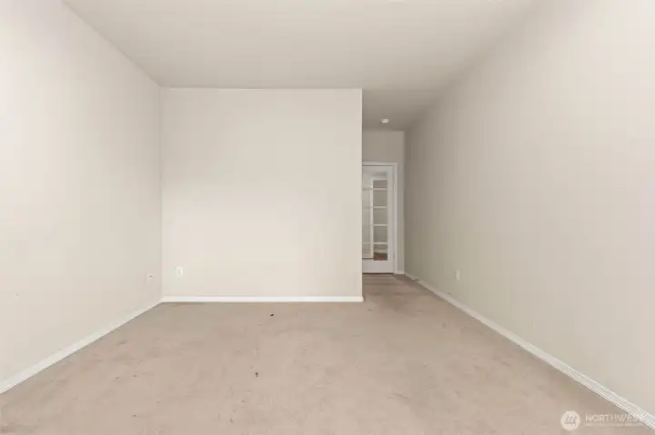 Downstairs bedroom with glass door