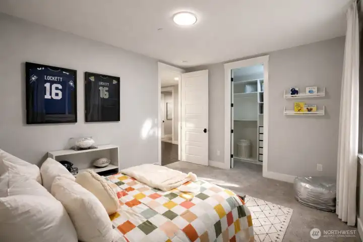 Second bedroom complete with walk in closet on upstairs floor