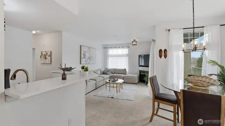 Bright, open-concept living with seamless flow from kitchen to dining to lounge.