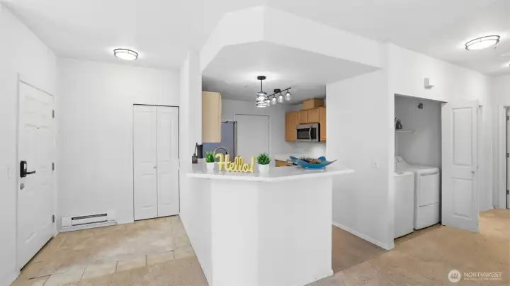 Welcoming kitchen peninsula creates the ideal space for entertaining or everyday living