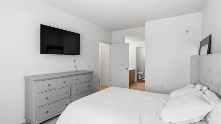 Enjoy the ease of a connected ensuite & walk in closet from this relaxing primary retreat.