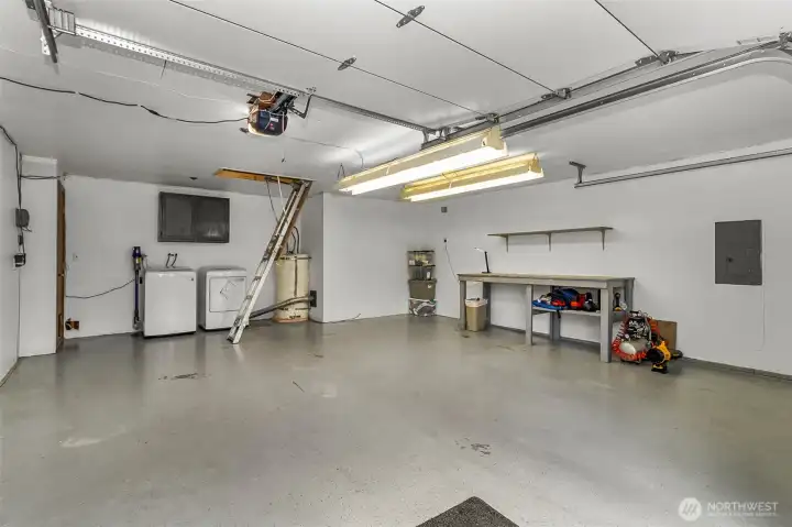 Fully finished garage w/work bench