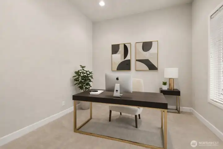 You'll be away from the fray in this spacious office at the front of home with French doors.   Virtual staging