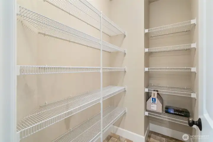Costco-sized pantry in the kitchen helps to keep everything accessible