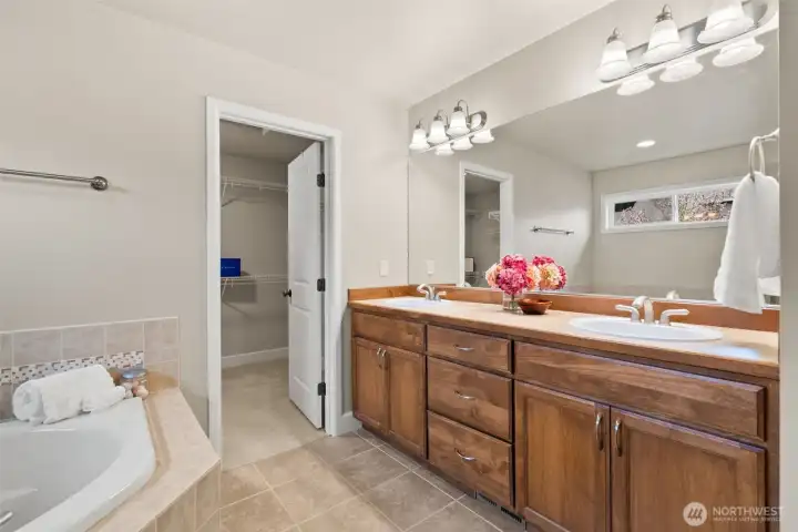 Dual sinks and lots of storage in the primary bathroom