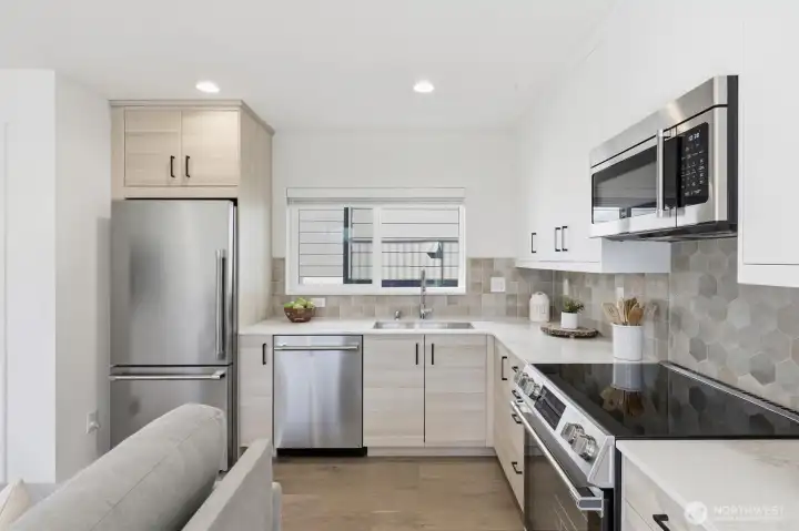 The kitchen is well-appointed with built-in microwave as well.