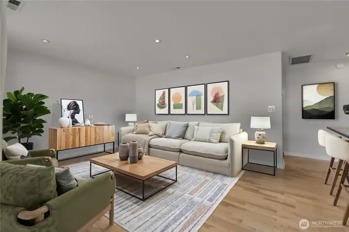 Large open Living Room with inset dimmable lighting to set any mood.    Photo is virtually staged.