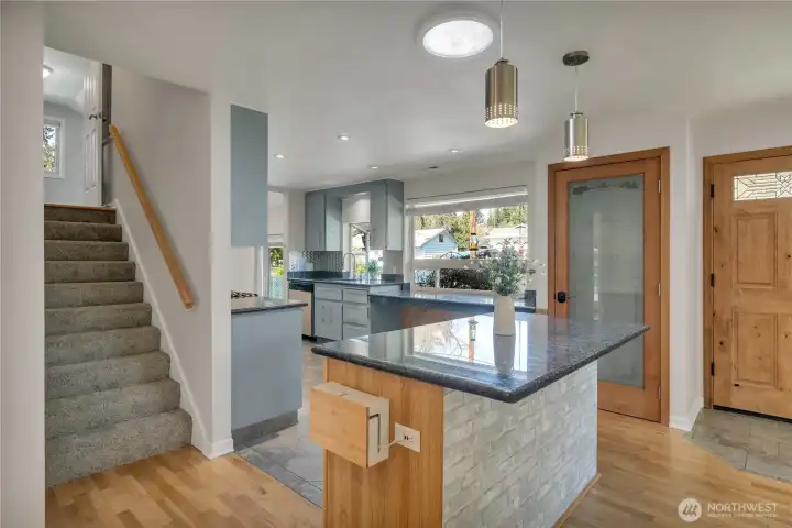 Spacious Kitchen Island offers overhanging counter which allows for seating.  The walk-in pantry is perfect for your Costco or Trader Joe runs.