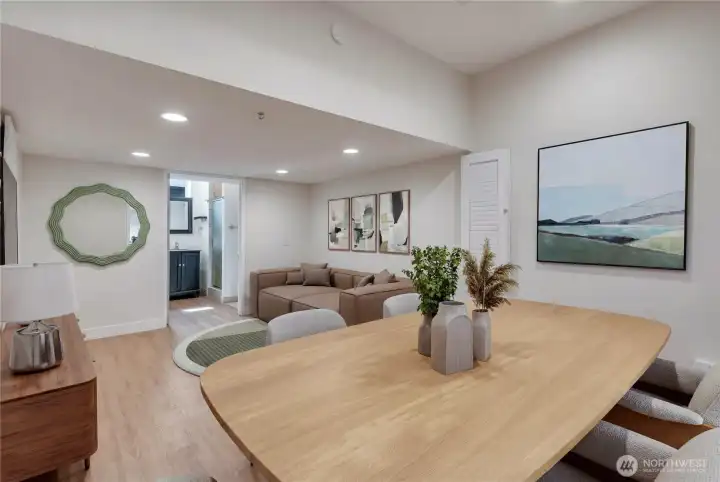 Step down into your spacious Dining and Family (Bonus) room.   Photo is virtually staged.