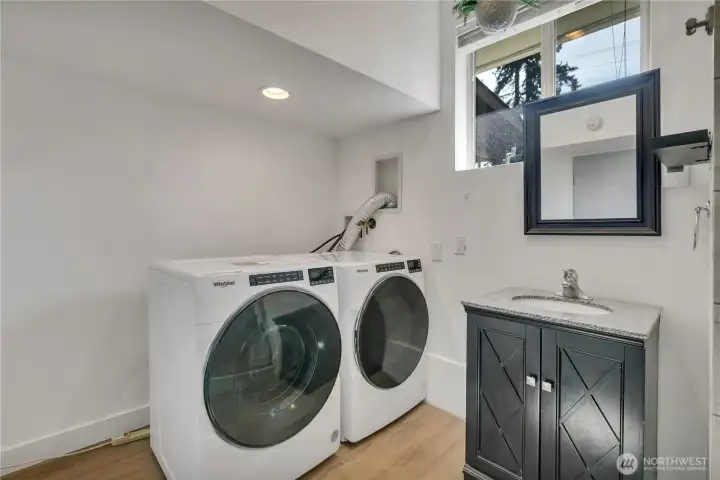 Laundry Room and lots of room for an organizational unit