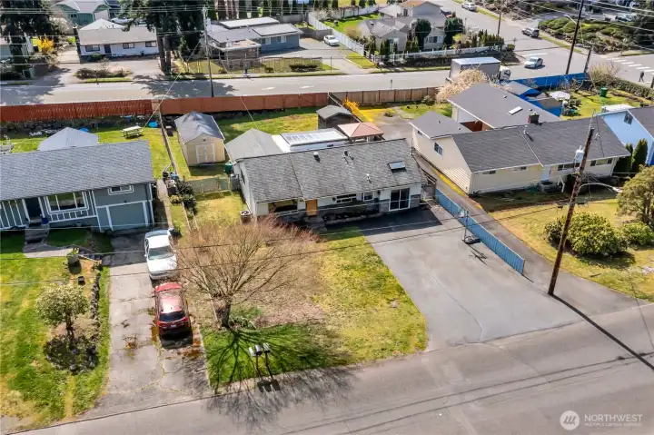 When this drone shot was taken the beautiful Japanese Maple was not quite budding, but it is the showpiece of the front yard!