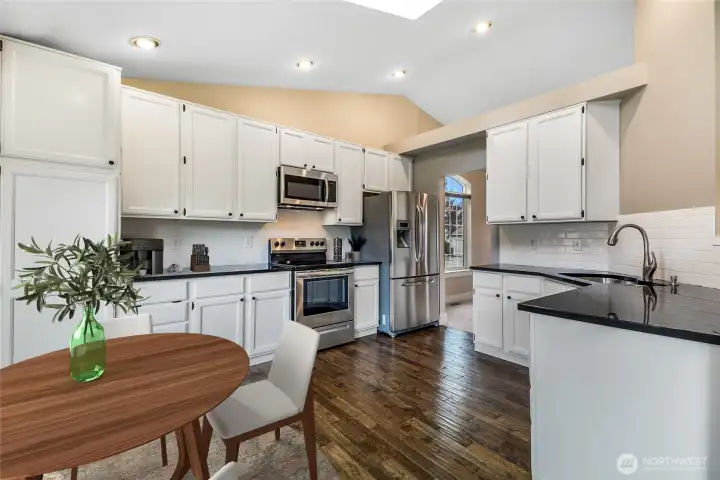 Another shot of the amazing kitchen.  Stainless appliances, white cabinets and black granite.  Spectacular!
