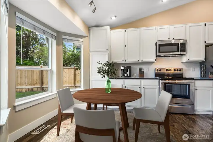 Breakfast nook looks out to the yard