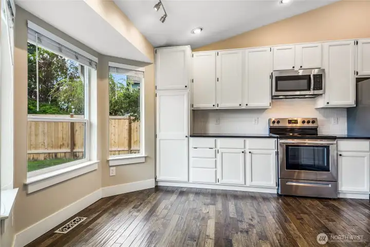 There is an abundance of cabinet and counter space in this kitchen