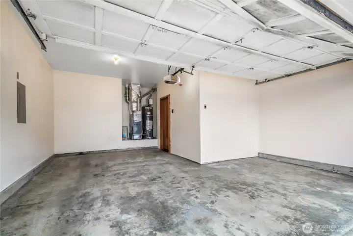Bring your tools and toys!  Plenty of room in this finished garage.