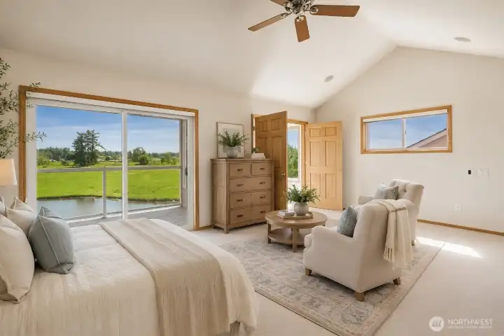 Virtually staged primary bedroom on main floor