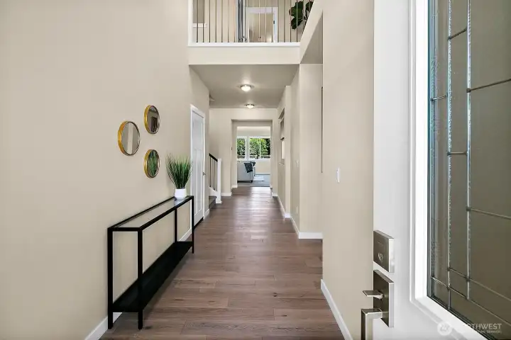 Entry with hardwood floors.