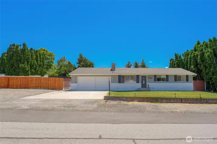 Large empty lot is to the left of the home. Large empty lot is to the left of the home.