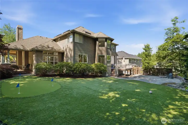 From the waterfall and firepit to the putting green and garden beds, every detail invites you to slow down and enjoy.
