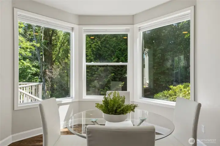 Enjoy morning coffee surrounded by peaceful backyard views