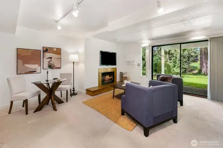 Downstairs family room, adjacent wet bar space