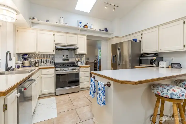 Another kitchen view; counters are well maintained Formica, and there's an overhead skylight Another kitchen view; counters are well maintained Formica, and there's an overhead skylight