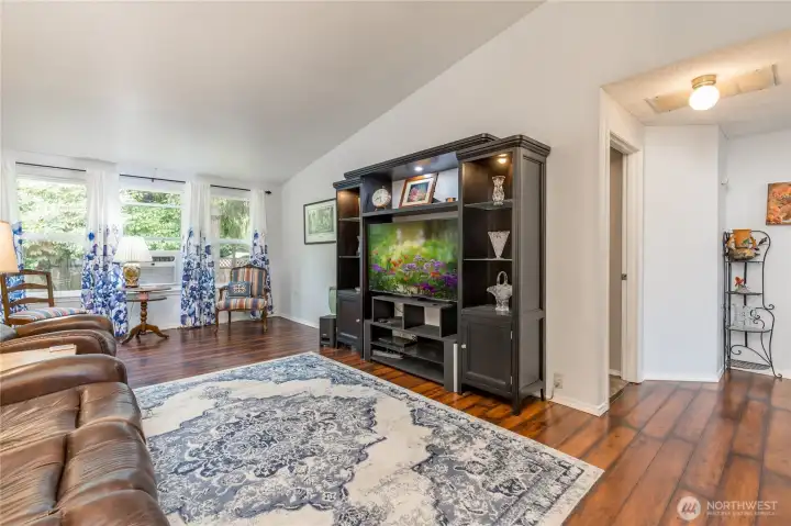 The living room is well situated, and has vinyl plank flooring and excellent ambient light The living room is well situated, and has vinyl plank flooring and excellent ambient light