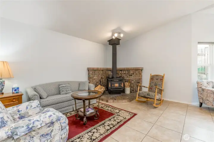 The family room corner wood stove The family room corner wood stove
