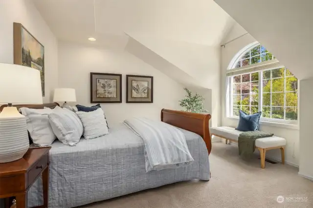 One of the three additional upper-level  bedrooms adds to the versatility and comfort  of the home.