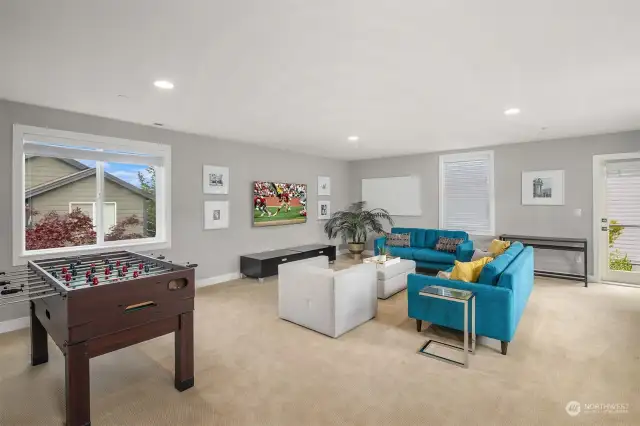 One of the best rooms in this house is the oversized bonus room. This is such a great space and it provides room for everyone to spread out. Catch a game or hang with friends, this room is a real game changer!