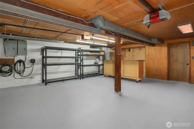 Two-car garage with EV charger, workspace & 2nd refrigerator
