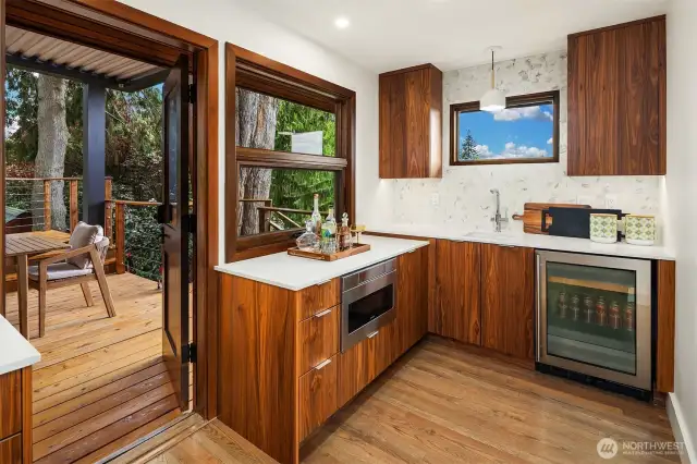 Wet bar with wine fridge and sparkling water system