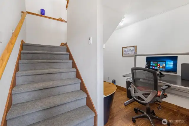 Stairs leading from the main floor to the lower level