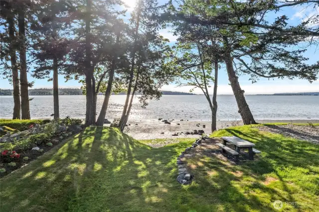 Community beach access is just steps away from the house