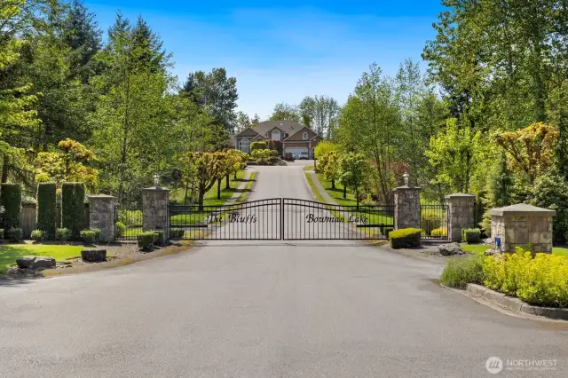 Welcome to the coveted gated community of The Bluffs at Bowman Lake.  A quaint 19 home community on large lots and nestled away off the main roads.   Includes private & secured RV storage!