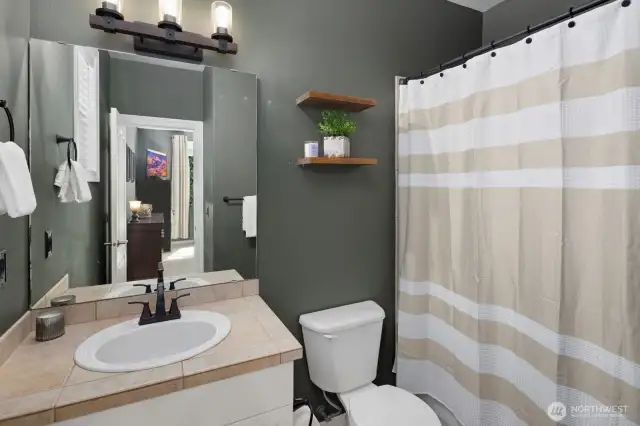 Private FULL bathroom off MAIN FLOOR bedroom.  Perfect for main floor living and or guest room!