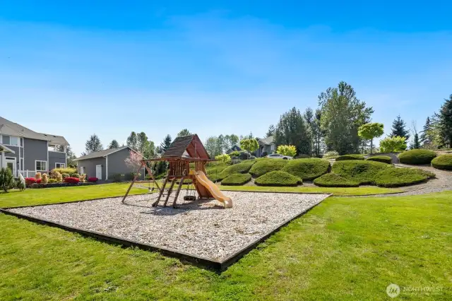 Neighborhood play area right across the street from this home!