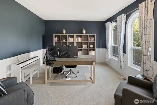 Office or living area off to the right of entry is full of natural light.