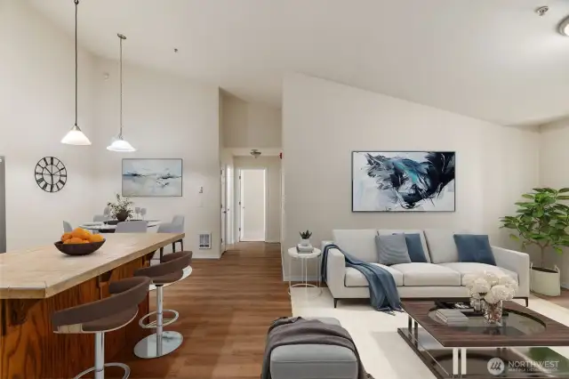 Spacious, open and airy, this home features a vaulted ceiling with Kitchen open to Great Room.  (virtual staging)