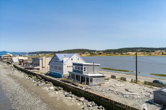 Two parcels, one vacant the other with fixer house.