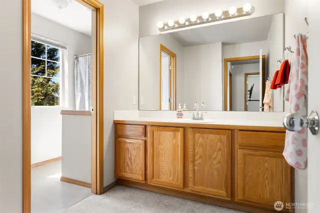 Main full bath on upper level