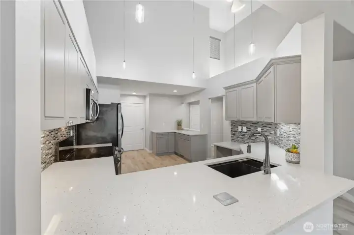 kitchen opening to great room