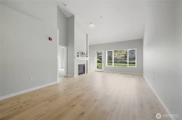 Great room with glass door to backyard