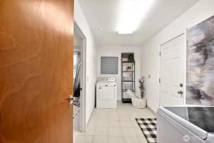 Convenient Mud Room & Utility Room w/ Easy Access to the Fenced Backyard!