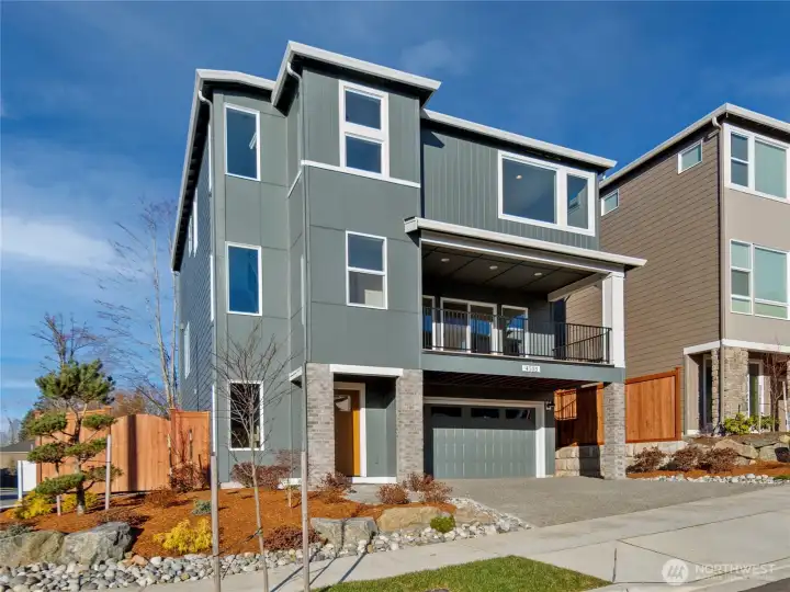 The Glacier Home Plan. All photos, renderings, site maps, and floorplans are for visualization purposes only. Plans, colors, building orientation, finishes, home outlook, and other details can and WILL vary. Striking three-level Glacier plan showcases a modern Craftsman façade with brick accents, vertical siding, and oversized windows for maximum natural light. Covered balcony and welcoming entry set the tone for refined living in Bothell’s Foxmoore community, close to Canyon Park conveniences and I-405 access.