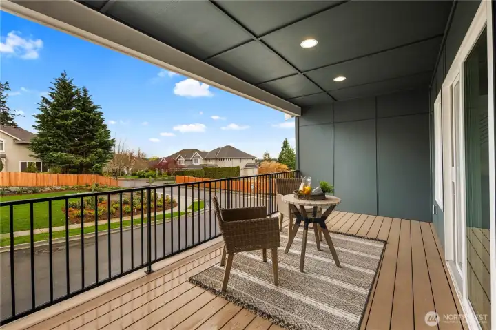 Covered Main-Level Deck: Spacious covered deck with recessed lighting and durable composite decking creates an ideal space for year-round outdoor living. Overlooking the landscaped street, it’s the perfect spot to relax, entertain, or enjoy a morning coffee.    Photos are from THIS model home at Foxmoore but are for visualization purposes only.