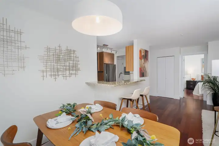 The thoughtful flow from living to dining to kitchen means you're never isolated from your guests or your space.