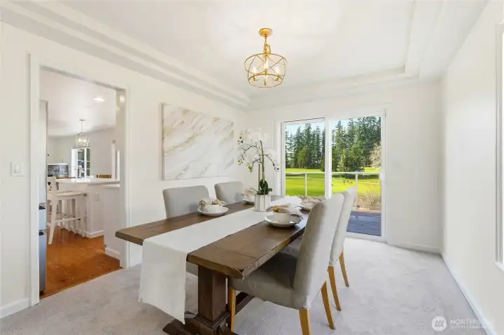 Dining room and west-facing rooms enjoy sweeping golf course views, including the iconic “Seasons Tree” beyond the fairway.