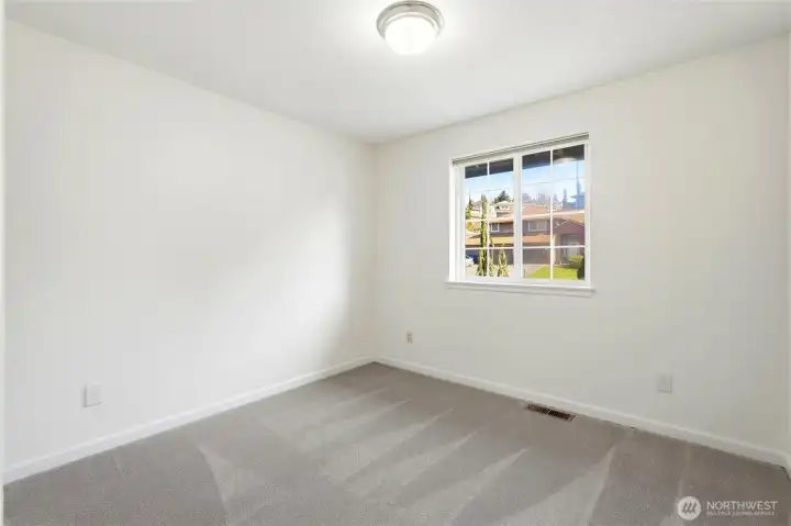 3rd upstairs bedroom offers tranquil neighborhood views.    Flexible bedroom space perfect for guests, workspace, or playroom.    Sunny bedroom with calming views of trees and open green space.    ?? Agent tip: In MLS galleries, alternating between view-based, function-based, and light-based captions keeps buyers subconsciously engaged as they scroll.    If you'd like, I can also give you a complete 25–30 caption set for the entire listing so every photo feels professionally marketed. It makes a surprisingly big difference in buyer perception.    completely remodeled 2nd floor bath    Beautifully remodeled second floor bath featuring a marble countertop vanity, updated lighting, and a bright tiled tub and shower surround. ???    ADU in daylight basement with full kitchen and 2 bedrooms    Spacious daylight basement ADU living area with full kitchen, open living space, and access to two bedrooms. Ideal for guests, extended living, or rental income. ??    Kitchen features island with sea