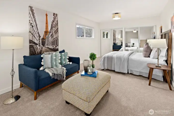 Large 2nd floor bedroom with adorable lighting and tons of storage.